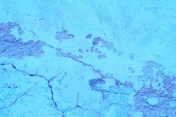 Wall fragment with scratches and cracks