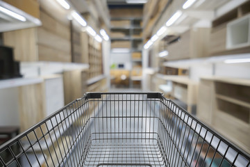 Abstract blurred photo of store with trolley in department store