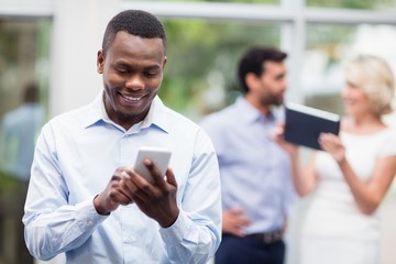 Businessman using mobile phone