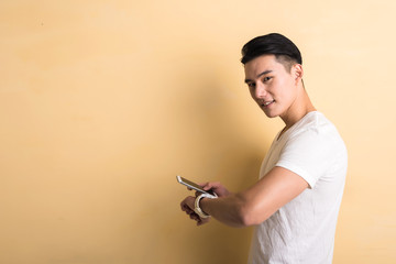 man using smart watch and phone
