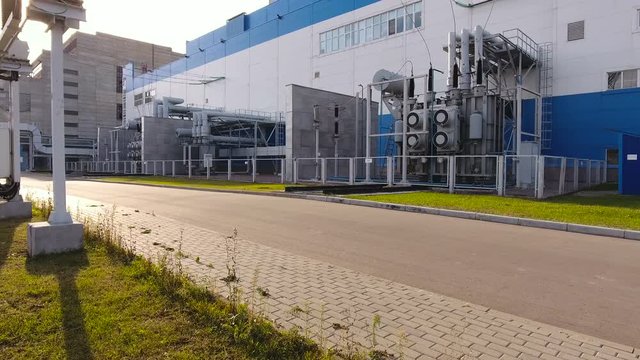 Aerial shot of modern thermal power station. Russia. Panorama of powerplant. 4K