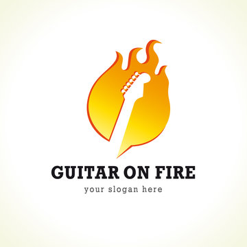 Rock concert vector logo. Guitar on fire. Rock band symbol. Electric guitar fretboard in flame. Art events and tours symbol.