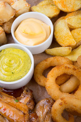 Beer snacks on wooden board