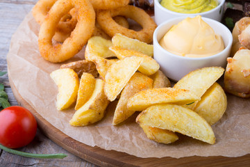Beer snacks on wooden board