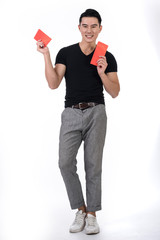 man holding red envelope