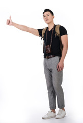 man hitchhiking and traveling