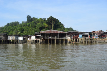 Naklejka premium River houses in Ranong, Thailand