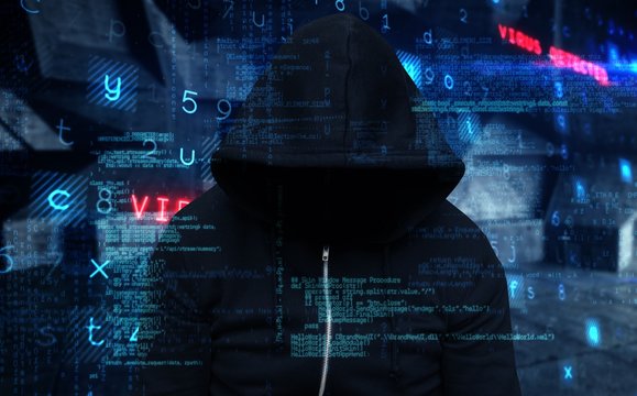 Composite image of burglar wearing black hooded jacket