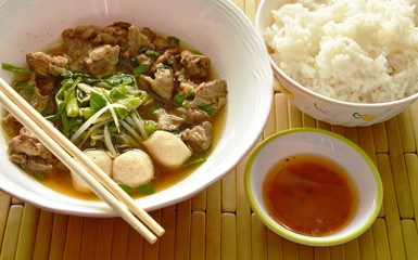 braised pork in brown soup and spicy chili sauce eat couple with rice