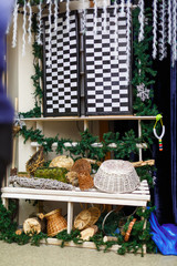 Wedding. Banquet. Mr. Mrs. signs on wooden board decorated by flowers and greenery lounge zone including chairs tables.