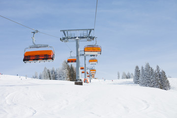 Fototapeta na wymiar Winter snowy landscape of a ski areal in Austria