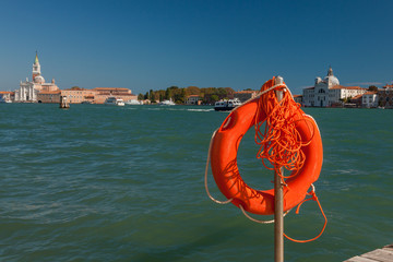 Lifebuoy on the waterfront in Venice, Italy