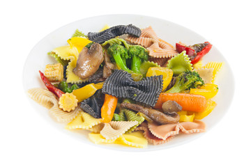appetizing colored farfalle pasta with vegetables