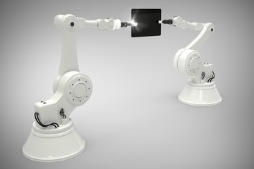 Composite image of composite image of robots with computer table