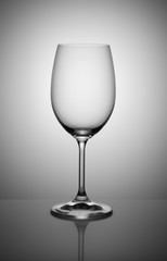 empty wine glass isolated on light gray background