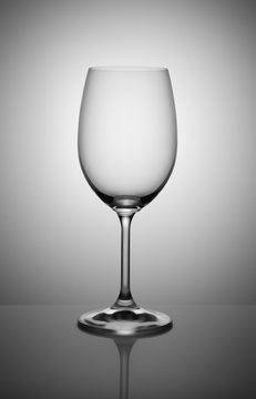 empty wine glass isolated on light gray background