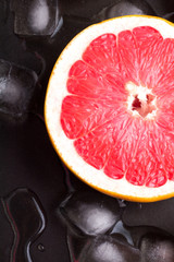 Grapefruit close up on a black background
