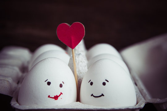 Love eggs couple with heart in the box