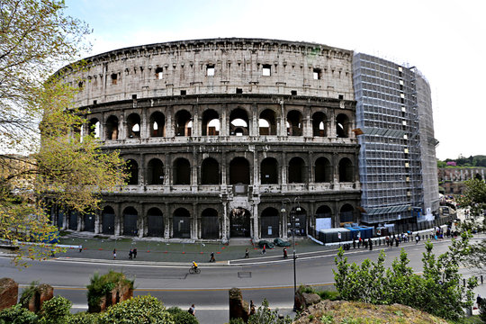ROME, ITALY - APRIL 3, 2014: The Colosseum - a monument of architecture of ancient Rome in the spring sunny day