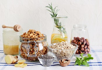 Granola and various superfoods products for healthy eating concept.. Detox program ingredients.Selective focus 