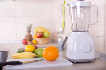 Blender with group of fruits