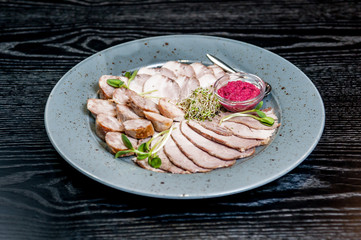 Sliced meat with sauce