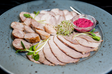 Sliced meat with sauce