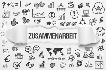 Zusammenarbeit / weißes Papier mit Symbole
