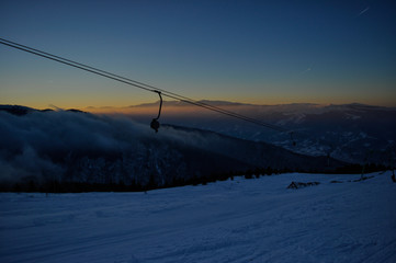 Fototapeta na wymiar Mountain in winter at sunset