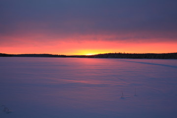 Sunrise over the Lake Palojarvi in Lapland, Finland