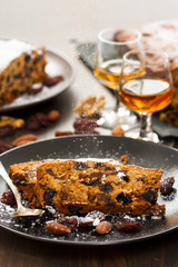cake with dry fruits on brown plate