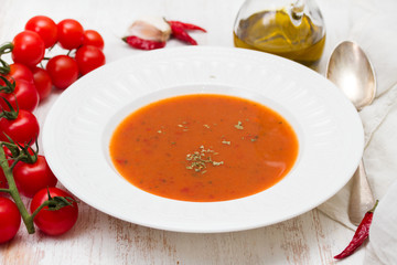 tomato soup in white plate