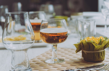 Beer and chips on the large white table