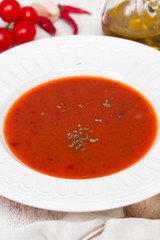 tomato soup in white plate