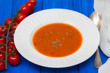 tomato soup in white plate
