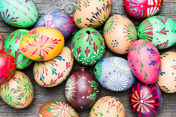 Fototapeta na wymiar Easter Egg. Colorful Eggs Heap on Wooden Background.