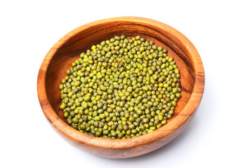 Raw mung bean in a wooden plate.