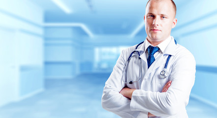 Doctor in the hospital. Light background