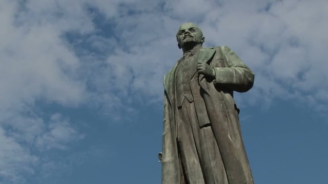 Time-lapse of clouds rushing over the statue of Lenin in Yalta, Ukraine 