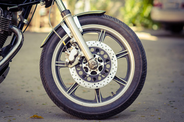 Fototapeta na wymiar Vintage disc brake with motorcycle wheel.vintage style.
