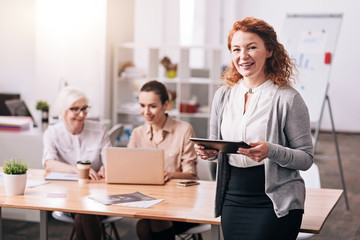 Smiling business lady working in the office