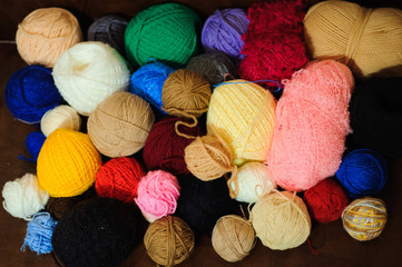 Colored balls of yarn. View from above. Rainbow colors. All colo