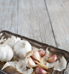 Organic garlic on wooden table