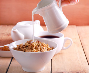 Muesli with fruit and nuts in a bow