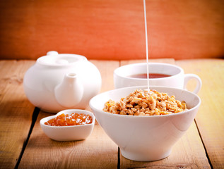 Muesli with fruit and nuts in a bowl