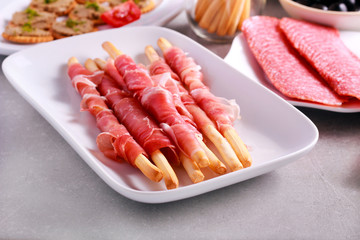 Mix of meat products and  appetizers served