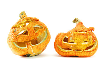 Old Halloween pumpkins isolated on white