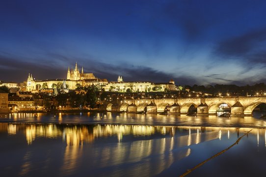 Nightscape of Prague,  Charles Bridge towards Hradcany Castle and St. Vitus Cathedral, Czech Republic
