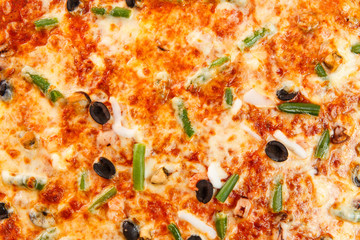 Part of delicious classic italian Seafood Pizza