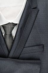 Classic male suit, shirt and tie, closeup.